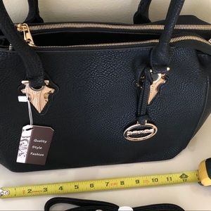 Sorrentino Concepts crossbody bag